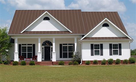 beige house with cocoa brown metal roof|beige metal roof.